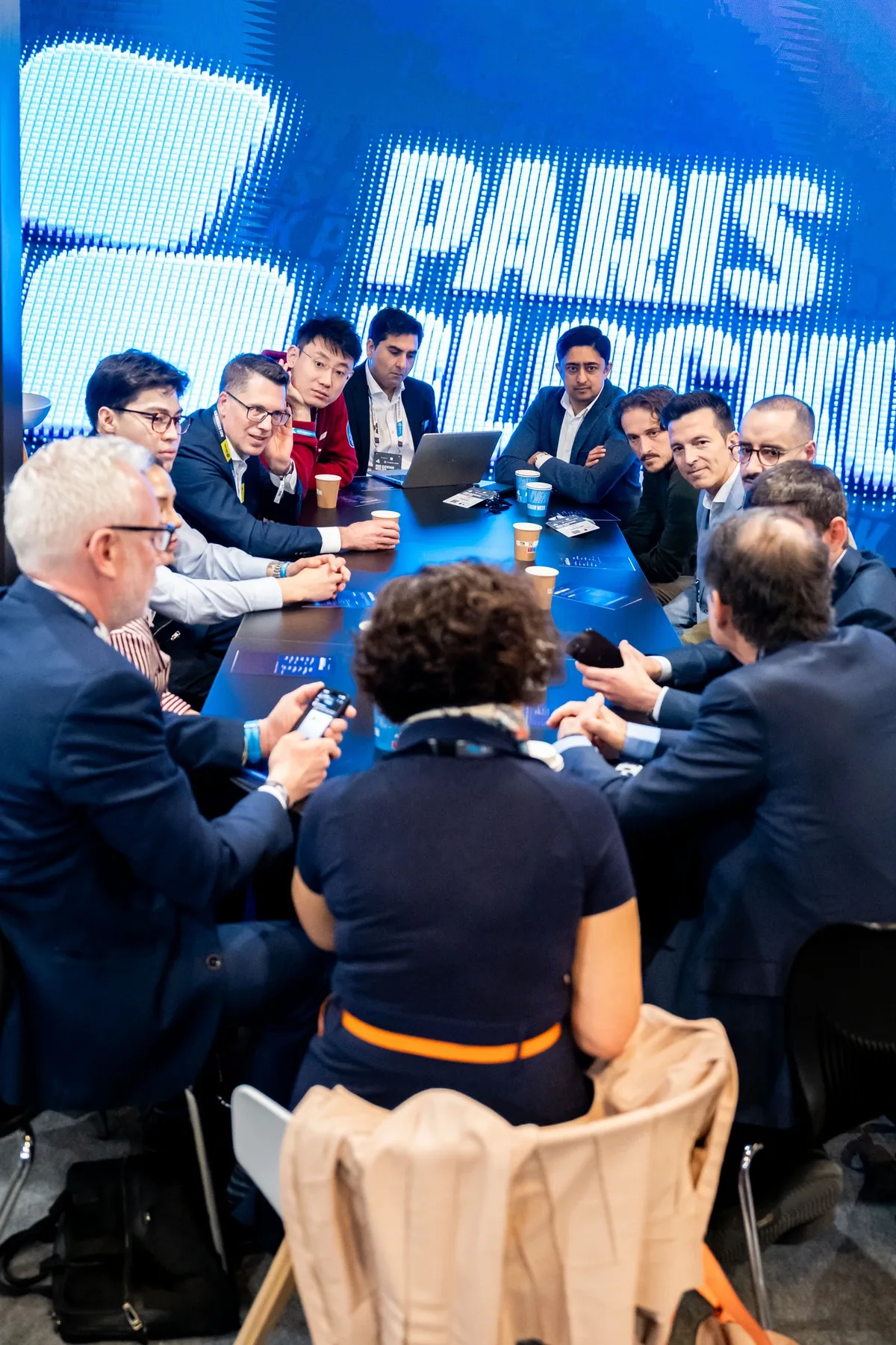 Senior finance and digital asset executives in strategic conversation